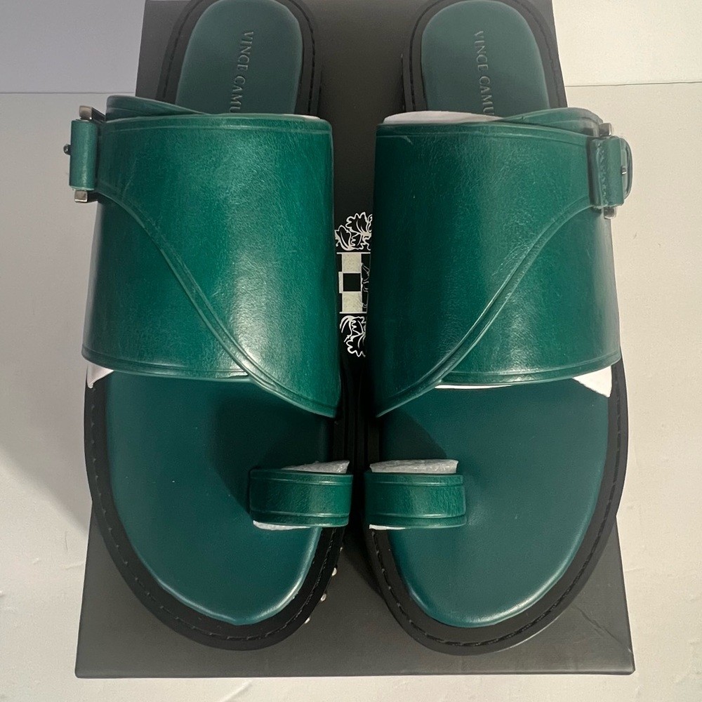 Vince Camuto Cooliann Toe-Ring Slide.  Vamp strap with asymmetrical buckle.